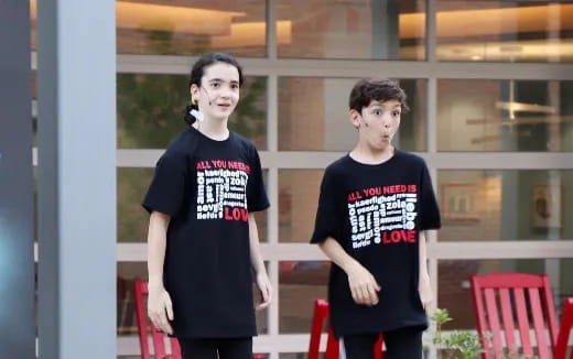 two people standing together