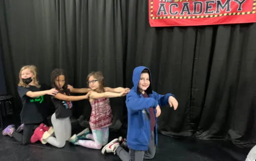 a group of people posing for a photo