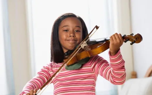 a person playing a violin