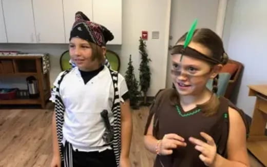 two girls wearing clothing