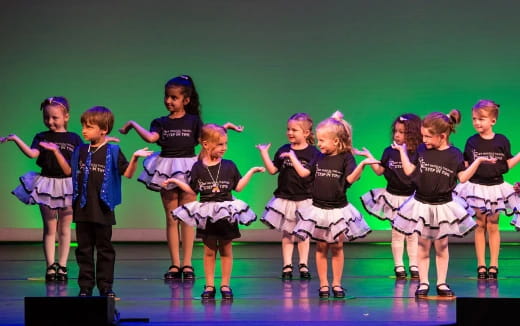 a group of children on a stage