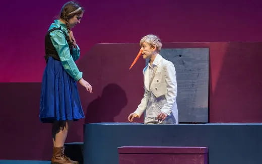 a man and a woman on a stage