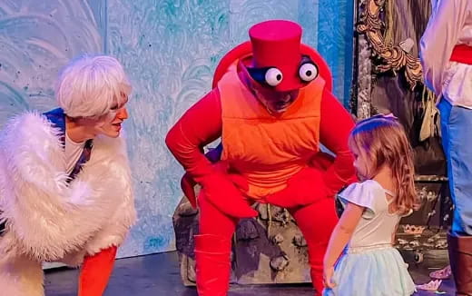 a person and a child in garment