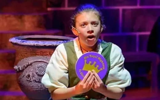 a person holding a drum