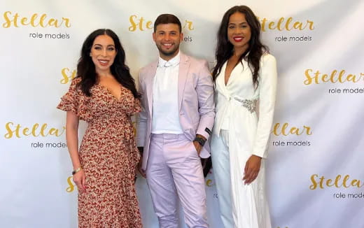 a group of people posing for the camera