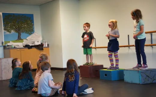 a group of children in a classroom
