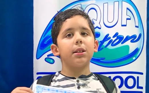 a boy with a microphone