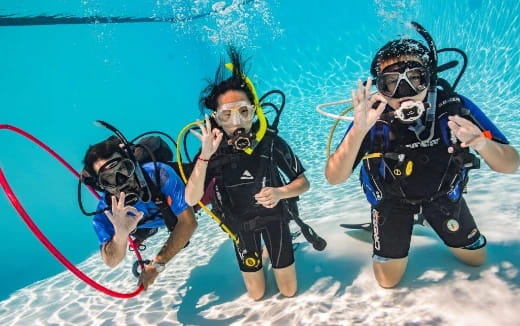 a couple of people in scuba gear