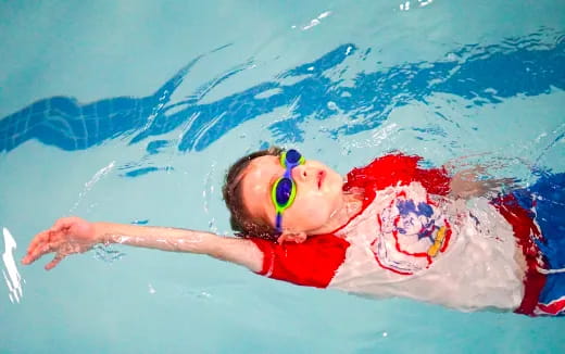 a person swimming in the water