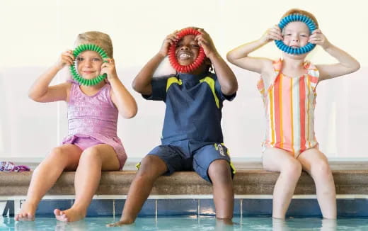 a group of children wearing clothing