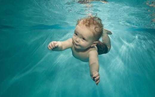 a child swimming in water