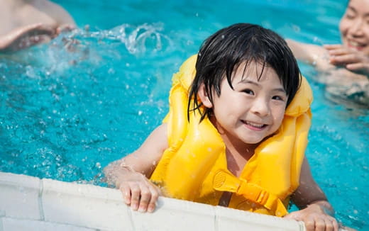 a child in a pool