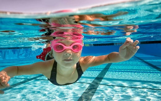 a woman in a pool