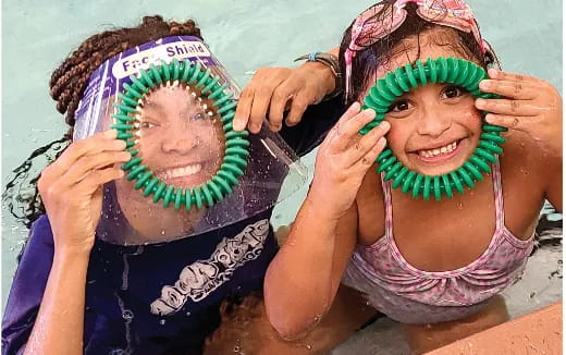 a person holding a watermelon
