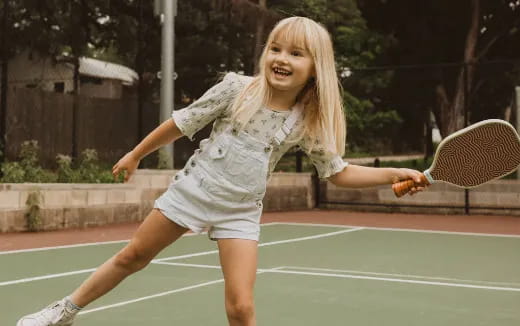 a woman playing tennis