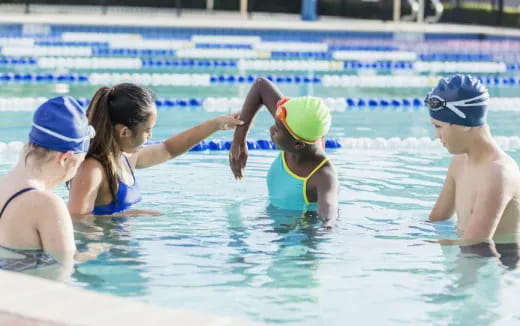 a group of people playing water polo