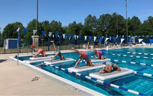 a group of people on surfboards