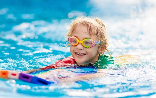 a child in a pool