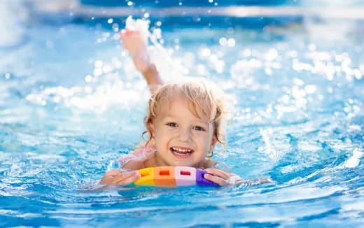 a child in a pool