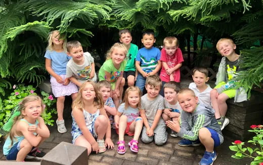 a group of children posing for a photo