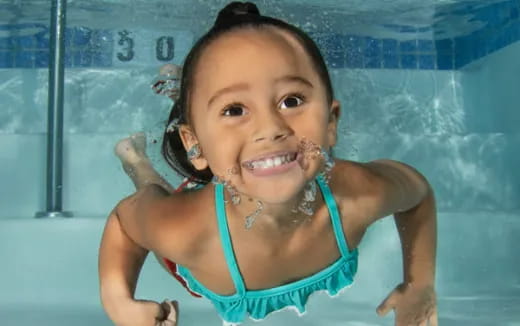 a girl in a pool