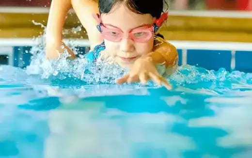 a girl in a pool