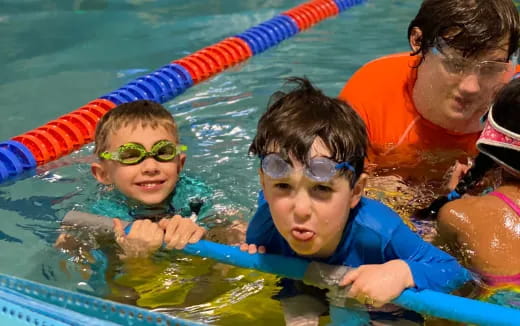 a group of people in a pool