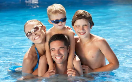 a group of people in a pool