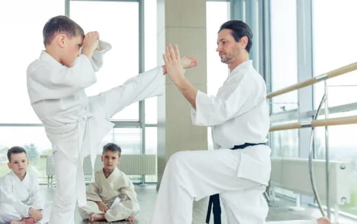 a man in white karate uniform
