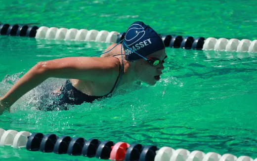 a person swimming in a pool