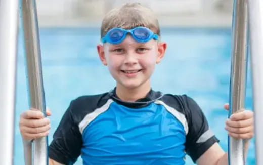 a boy wearing goggles