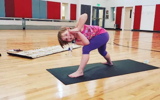 a woman doing yoga