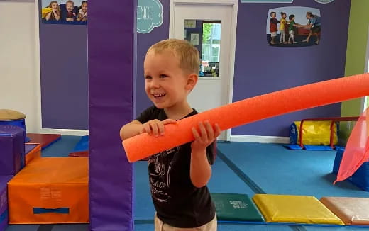 a boy holding a bat