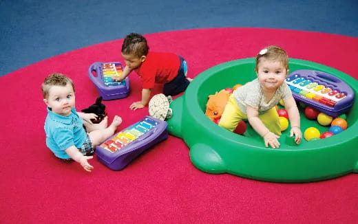 a group of kids playing in a ball pit