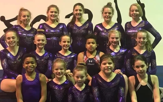 a group of women posing for a photo