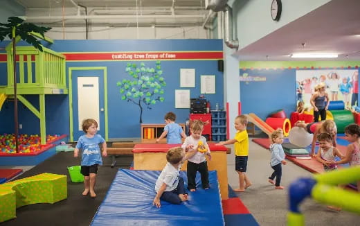 children playing on a mat