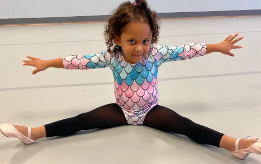 a baby on a white surface