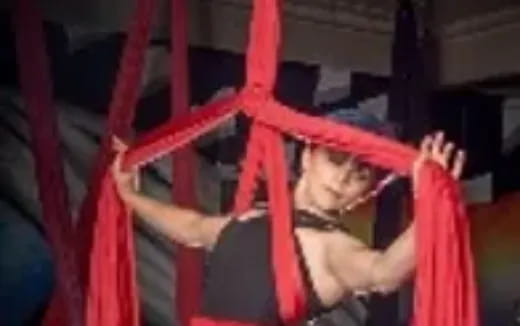 a person in a red cage