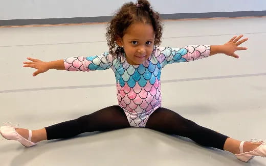 a baby on a white surface