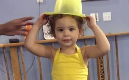 a child wearing a hat