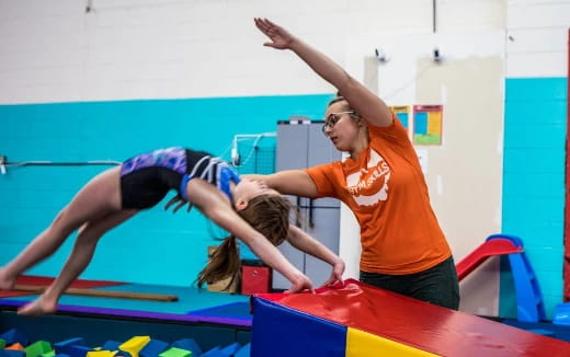 a group of women doing yoga