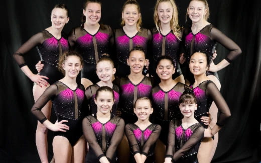a group of women posing for a photo