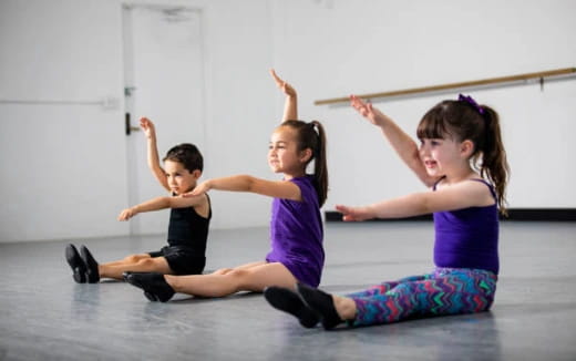 a group of children exercising