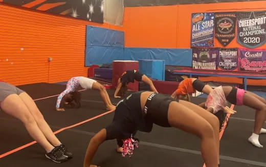 a group of women in a gym
