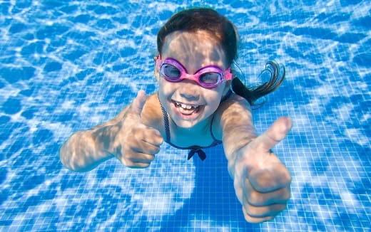 a child in a pool