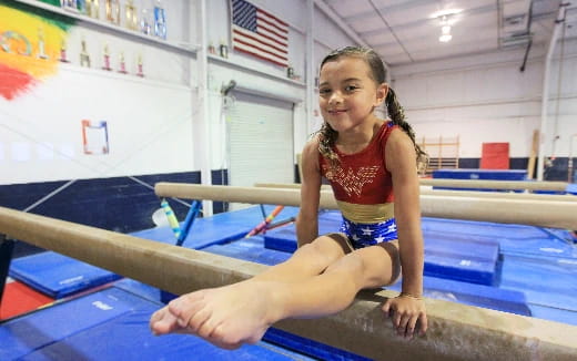 a young girl in a gym