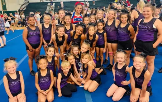 a group of women posing for a photo