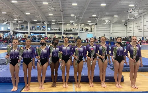a group of women in a gym