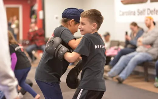 a couple of boys hugging