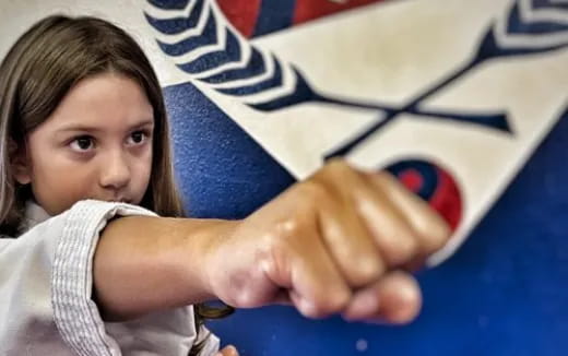 a girl holding a flag